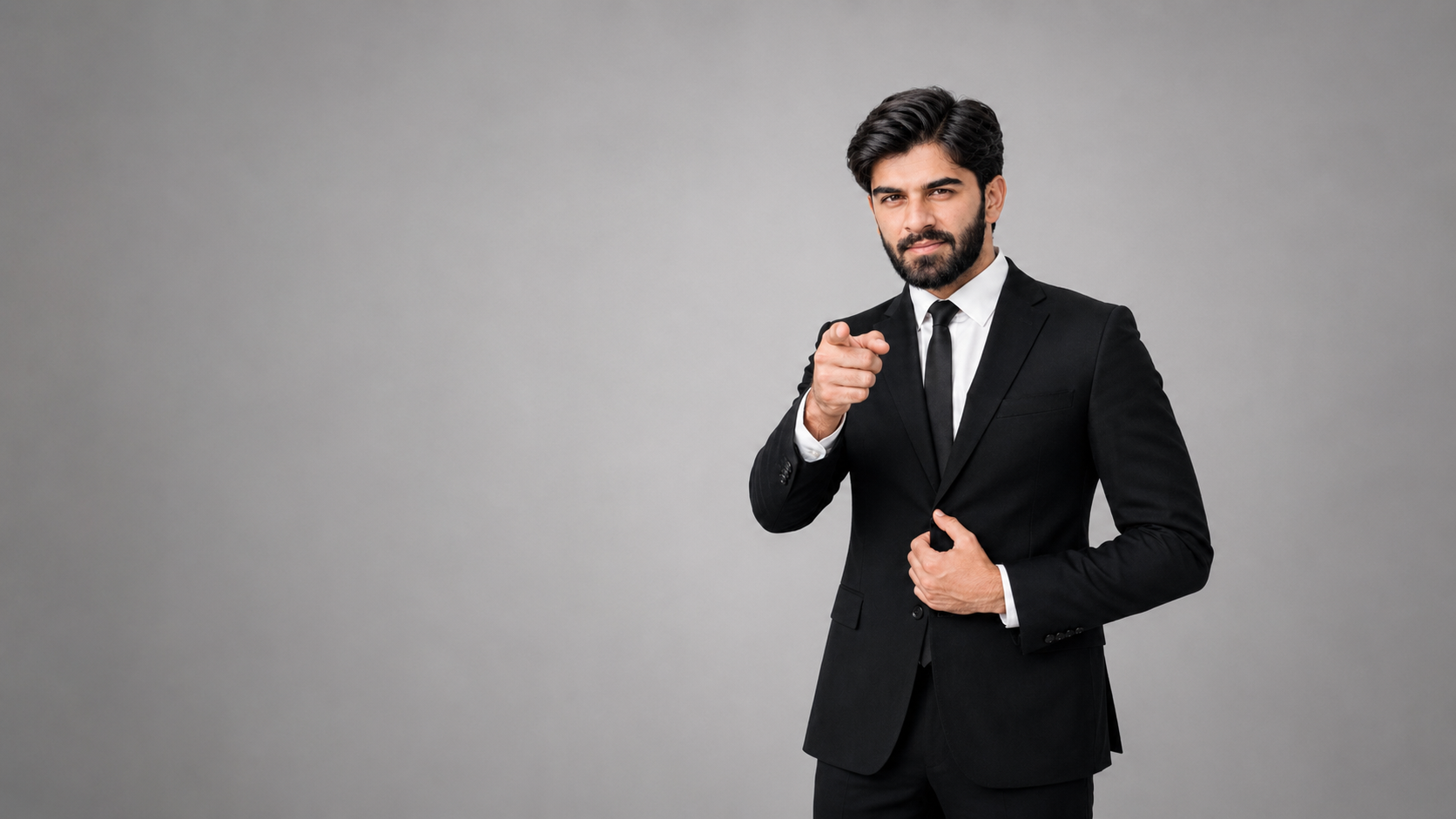 Muhammad Waseem in a black suit